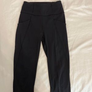 Lululemon black leggings, cropped 23”with pockets size 2